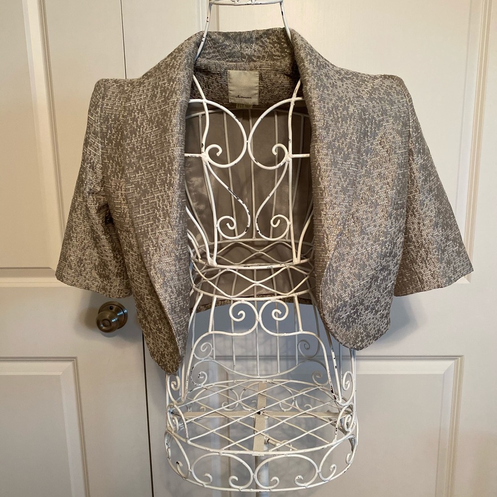 Silver cocktail jacket.
